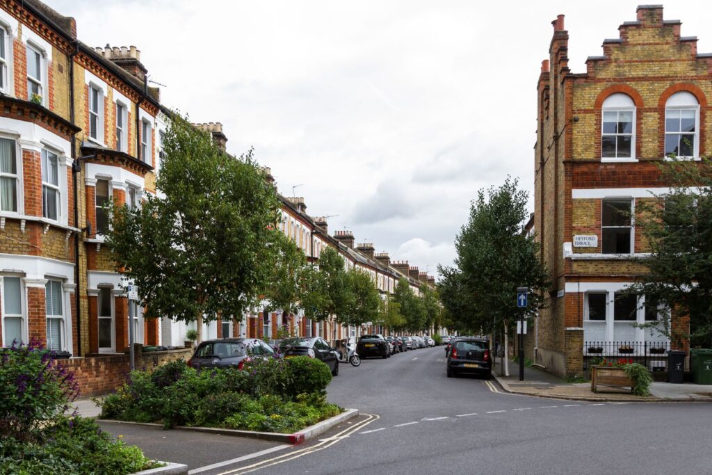Tree-lined street of Victorian terraced houses